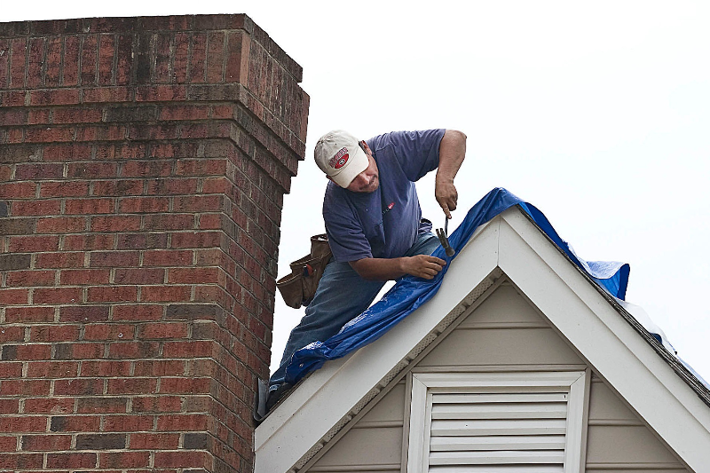 How to Tarp a Leaking Roof A StepbyStep Guide KTM Roofing Boston
